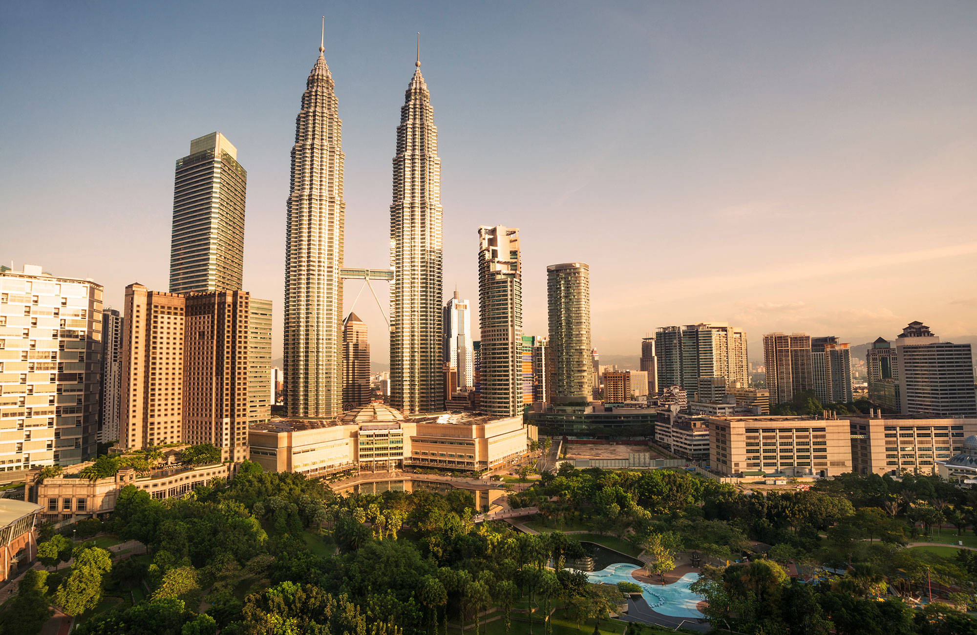 Skyline of Kuala Lumpur with the Petronas Towers in the middle.