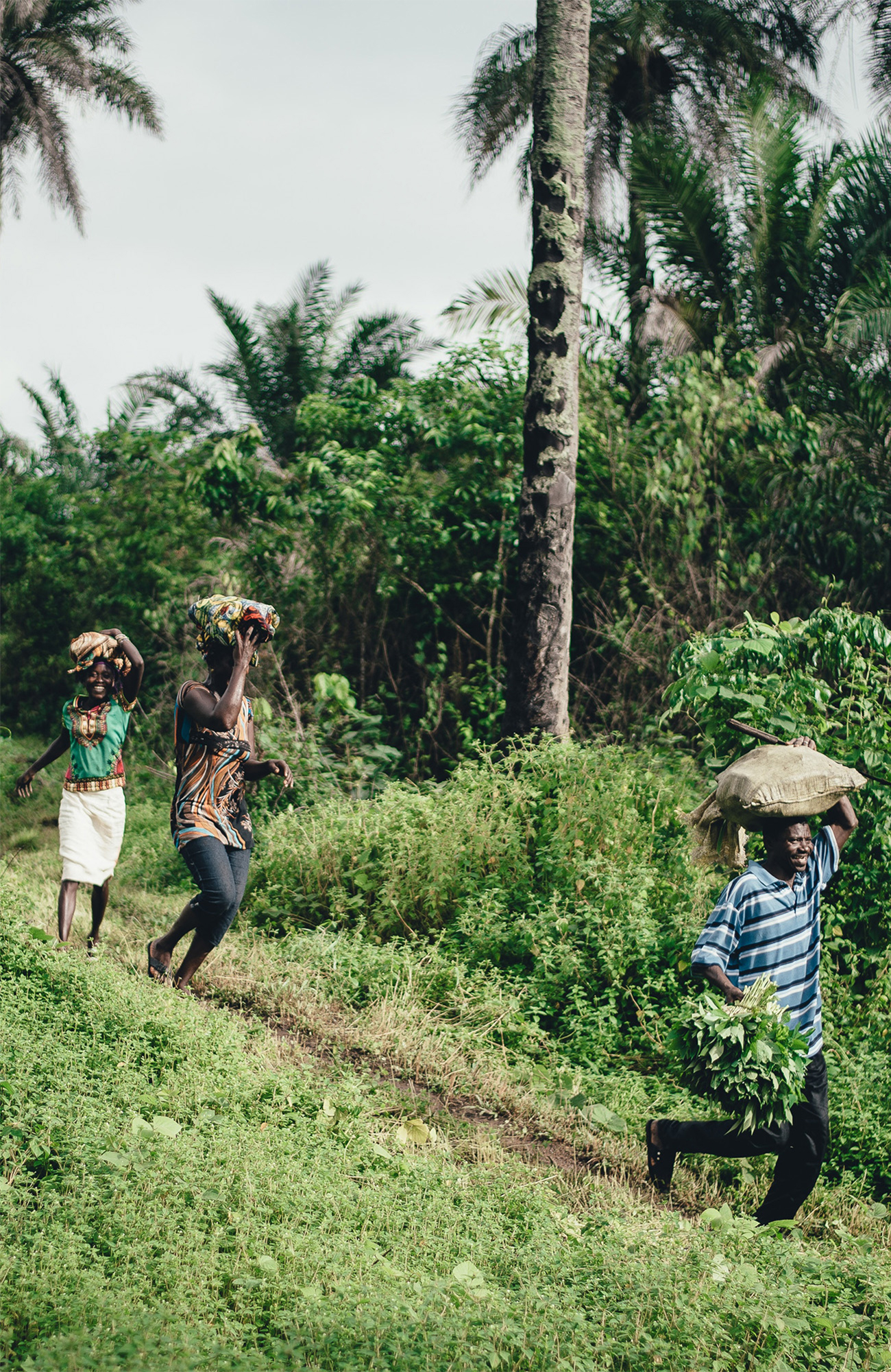 tanzania-people-walking-green-lush-sidebar