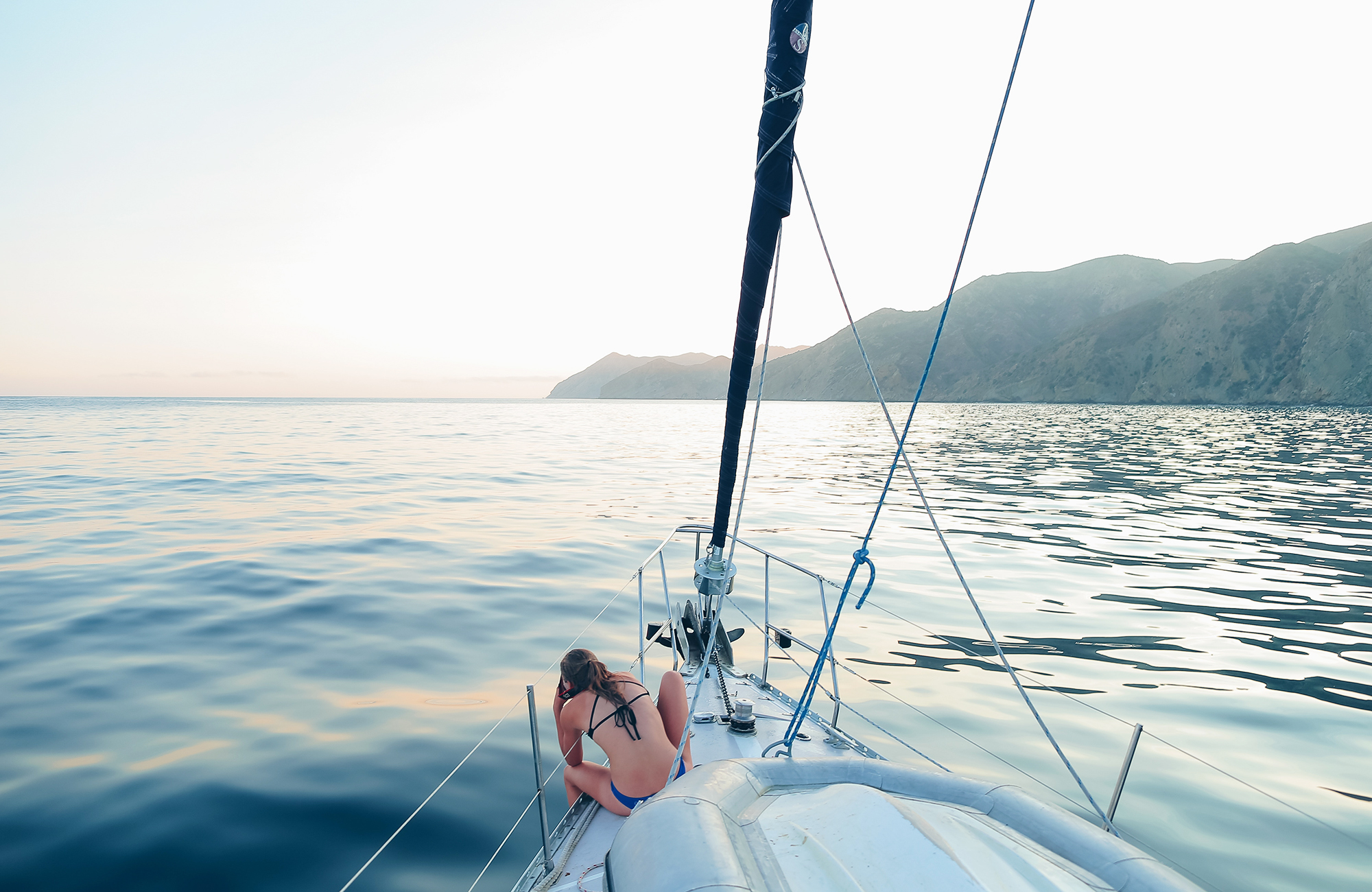 sailing-girl-in-bikini-on-a-boat-cover