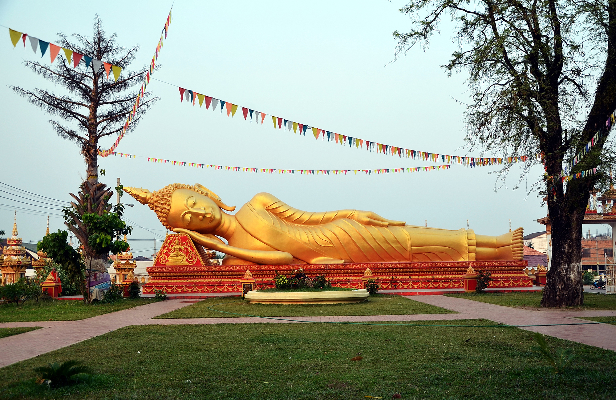 vientiane-laos-golden-reclining-buddha-statue-evening-cover