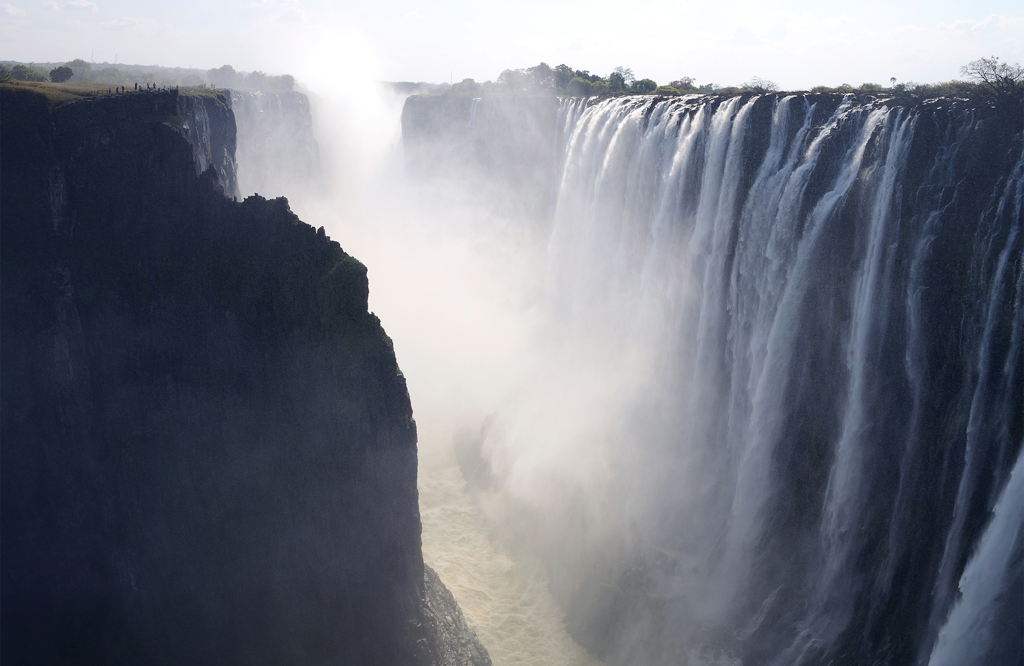 victoria-falls-zimbabwe-misty-waterfall-canyon-cover