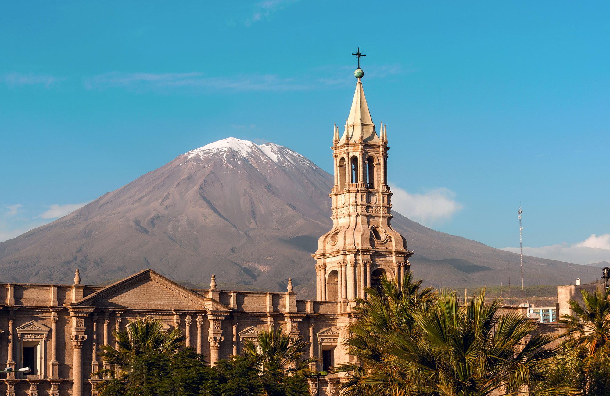 Church in the city of Arequipa with mountain in the background in Peru