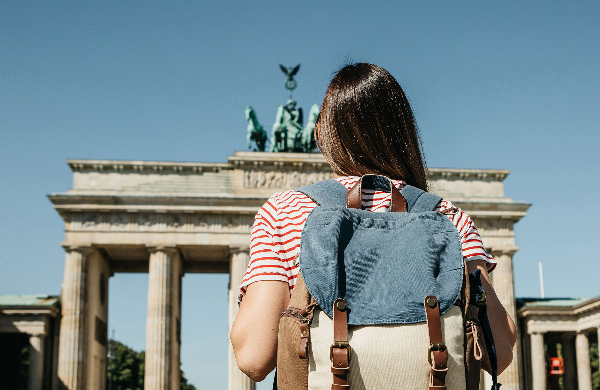 germany-berlin-girl-student-tourist-brandenburg-gate