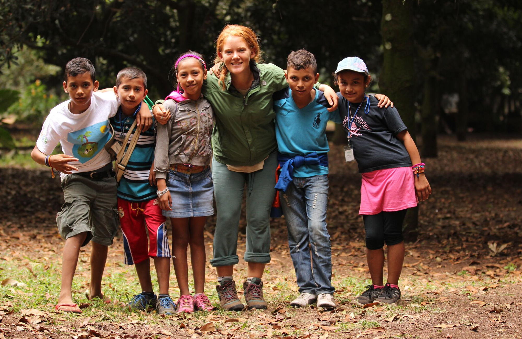 student volunteering with kids in monterrico in central america