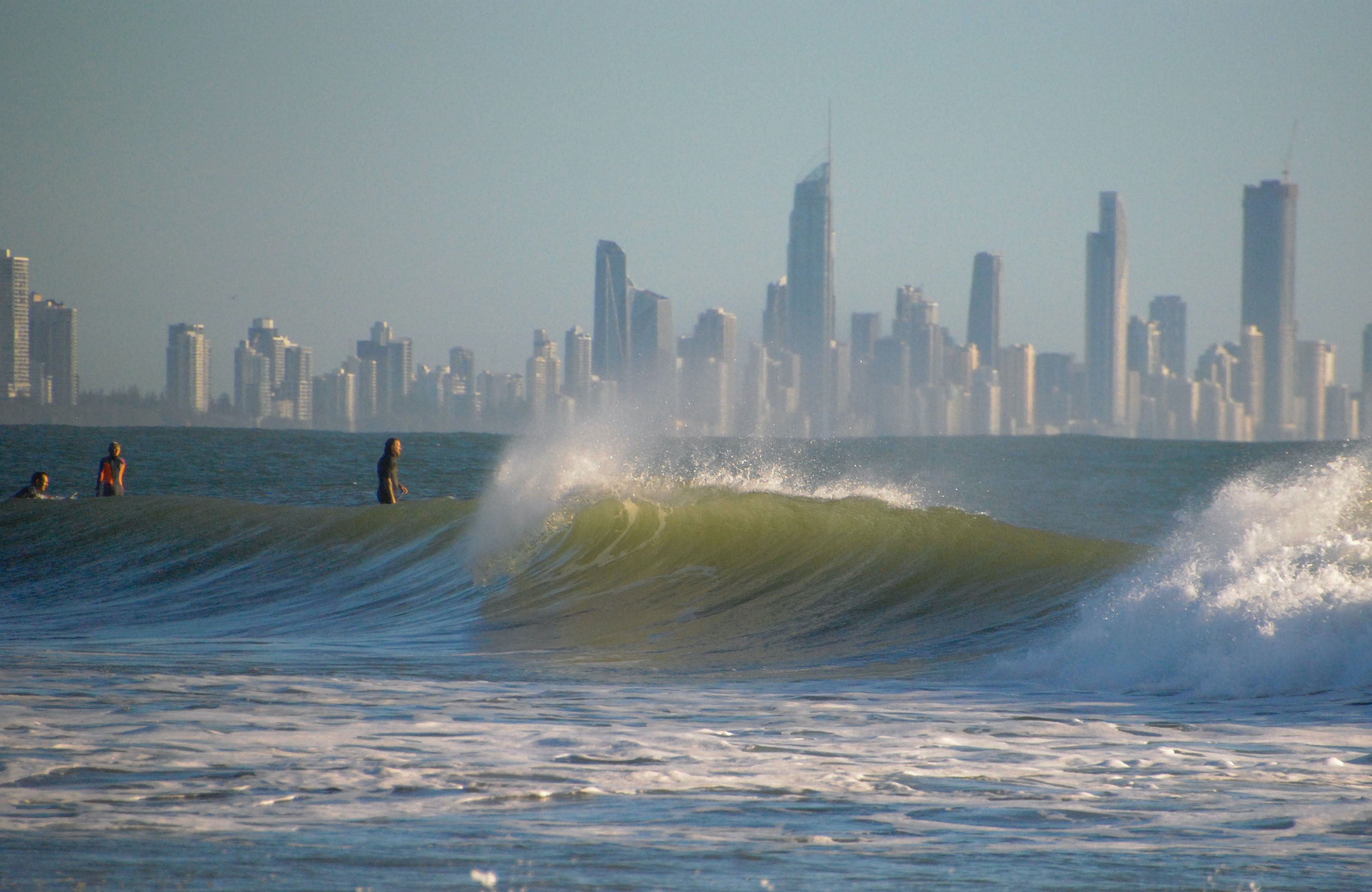 Surfers in the ocean at Gold Coast in Australia